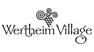Logo von Wertheim Village als Referenzkunde von Foodtruck Catering